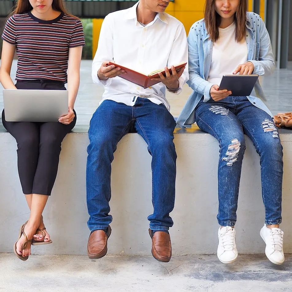 A Group Of Students Are Sitting On A Counsellor Doing Their Home IT-Center Fyn
